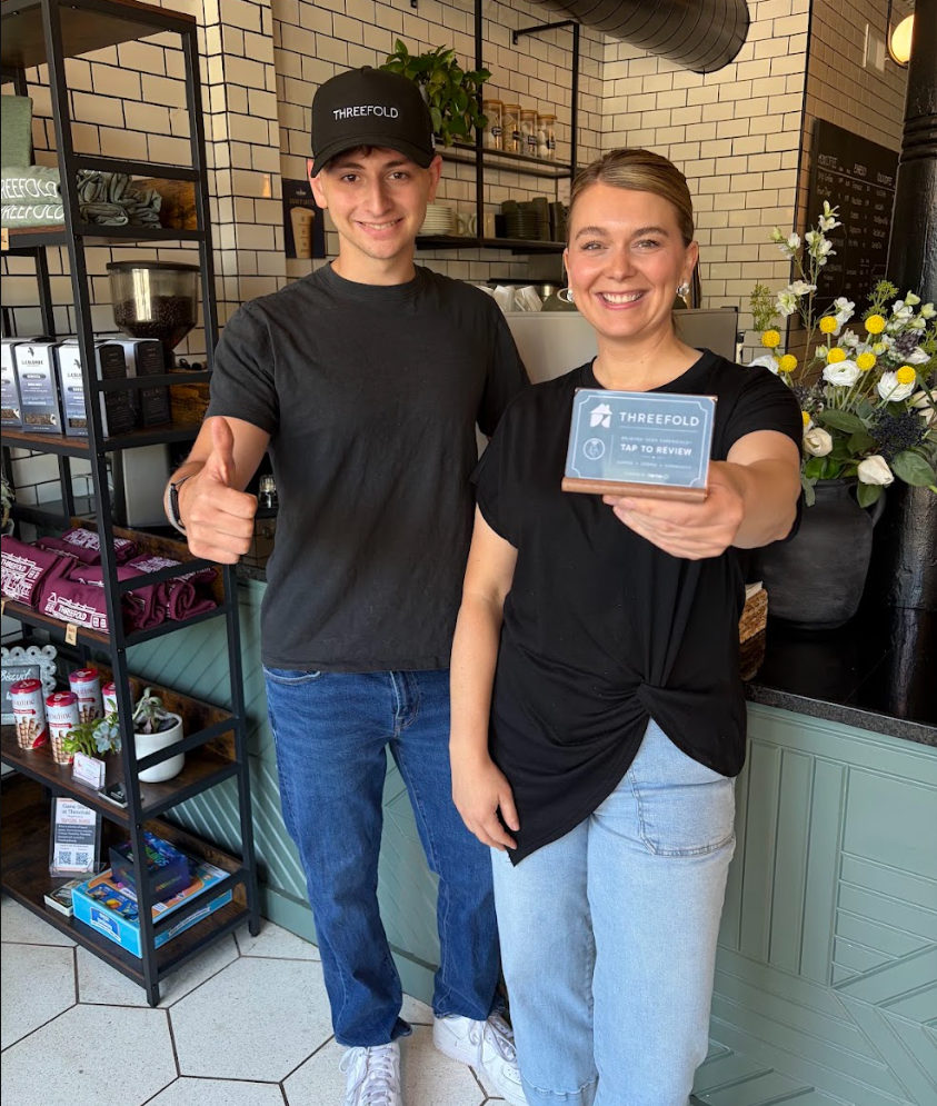 Tap-Tap founder with the Threefold team holding their review plaque